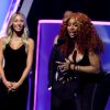 SZA Struggles On Way To Stage At AMAs